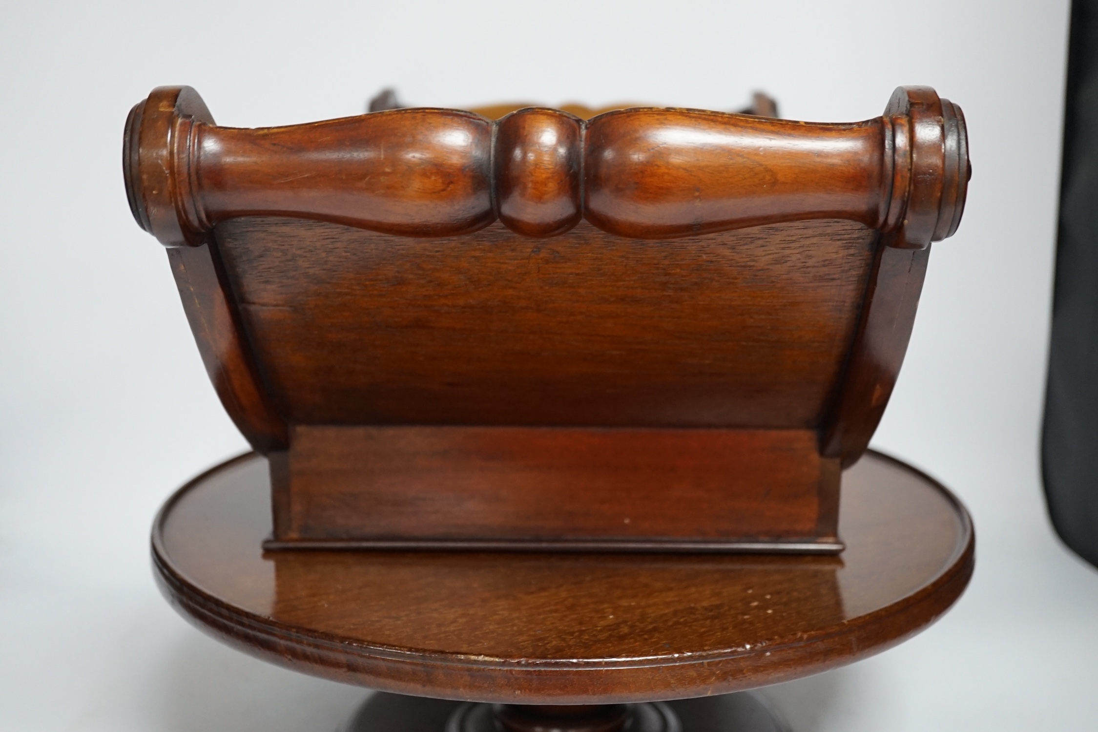 A large reproduction mahogany cheese coaster and a Lazy Susan, largest 50cm wide
